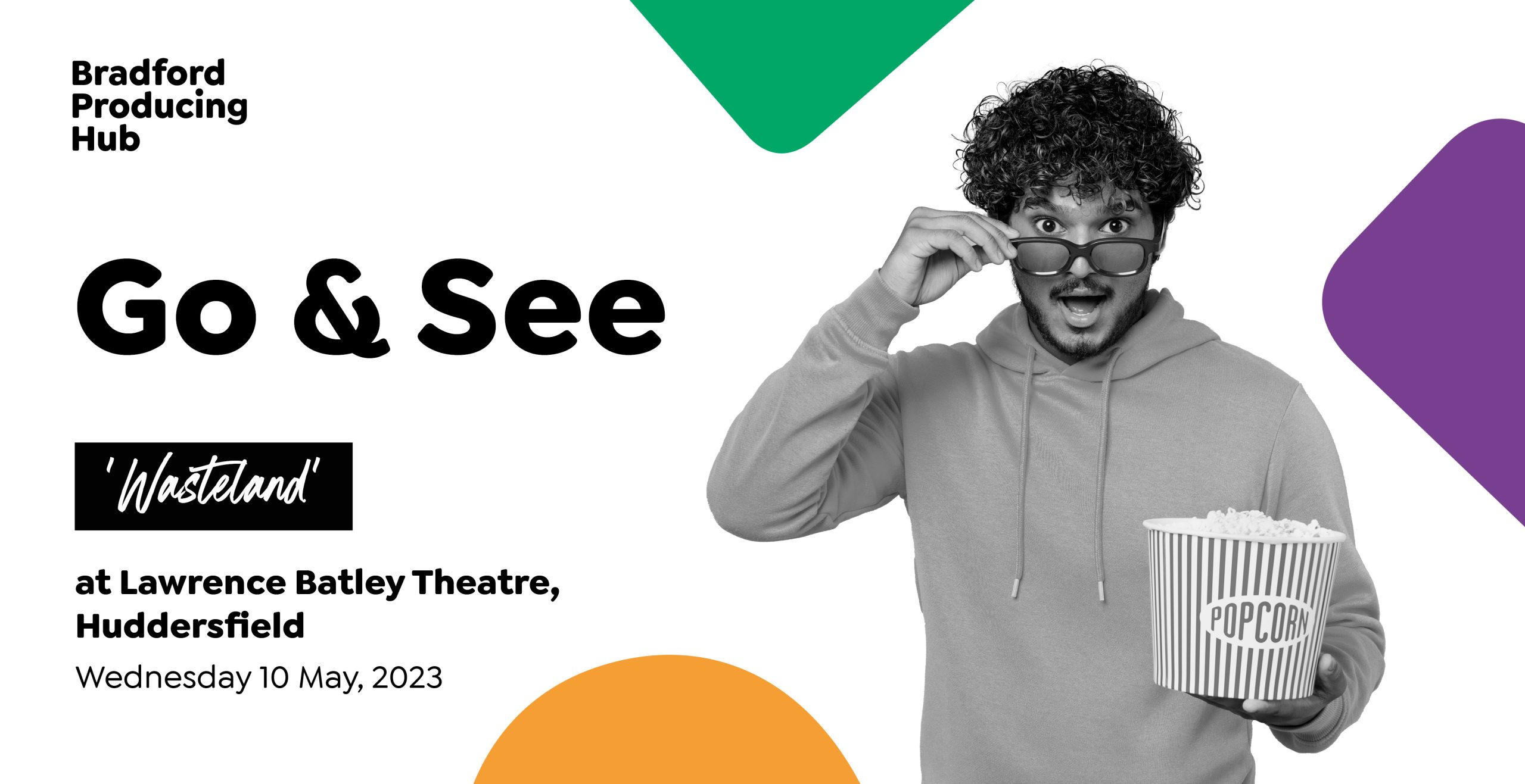 A man with dark curly hair and holding a container of popcorn peers over his glasses and looks animatedly to the camera. The text reads "Go and See Wasteland at Lawrence Batley Theatre on Wednesday 10 May 2023