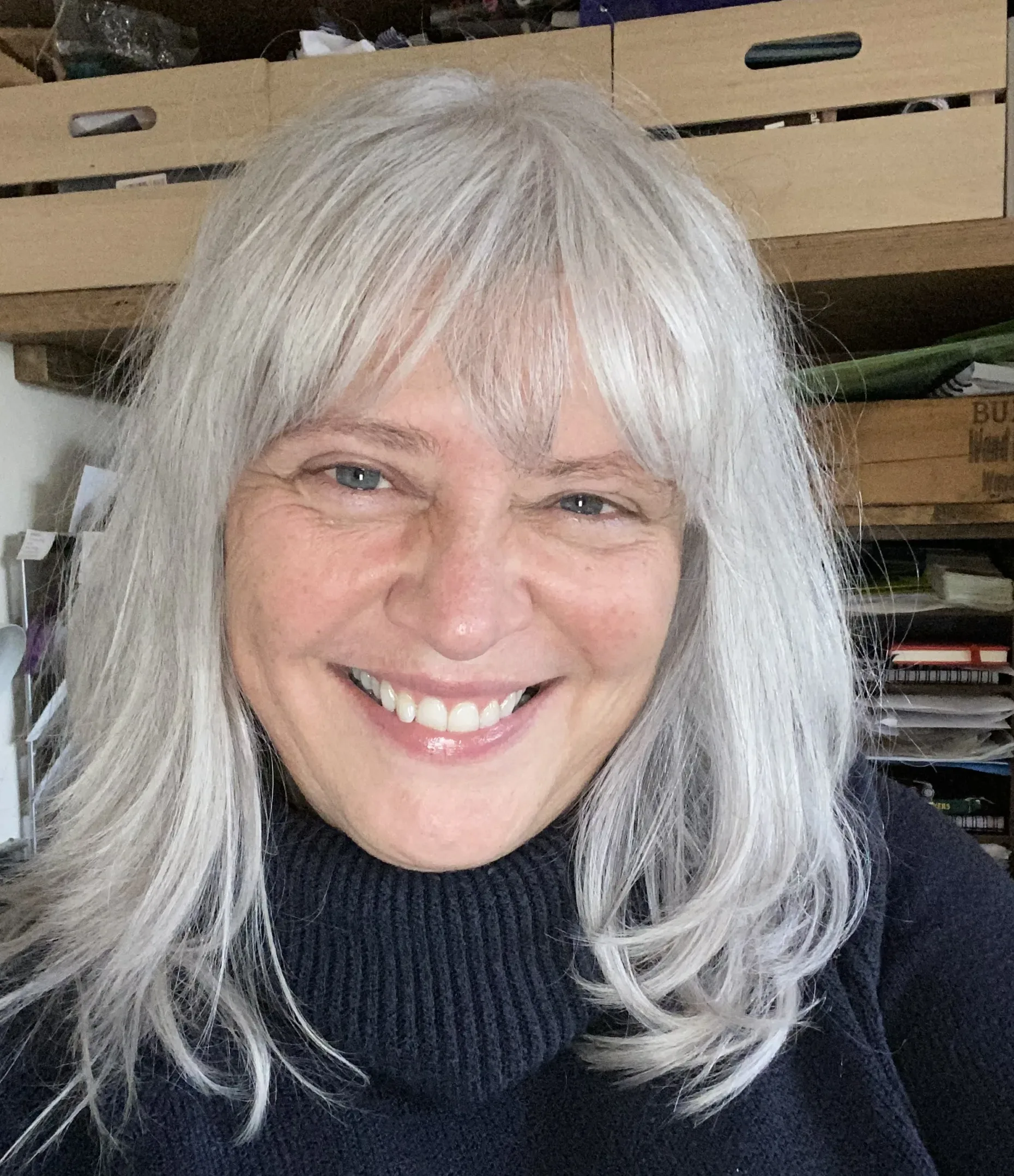 Our Access Champion Vicky Ackroyd is a white woman and has shoulder length white hair with a fringe and light eyes.