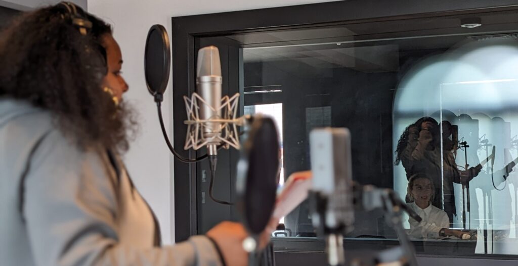 Bradford music artist Kemmi Gill recording vocals at TYX Studios at Tileyard North during Bradford Producing Hub's women in music development day in 2023.