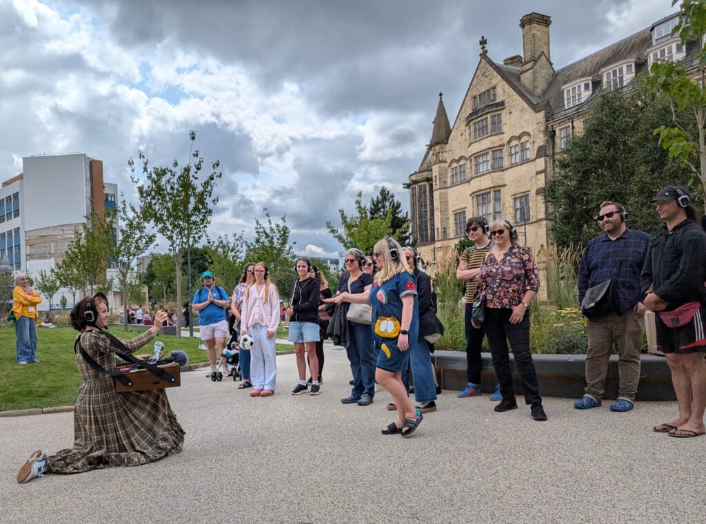 Four Nations bursary recipient Fran Bundey as Charlotte Bronte at BD Festival and her walkabout performance, senseless trash.